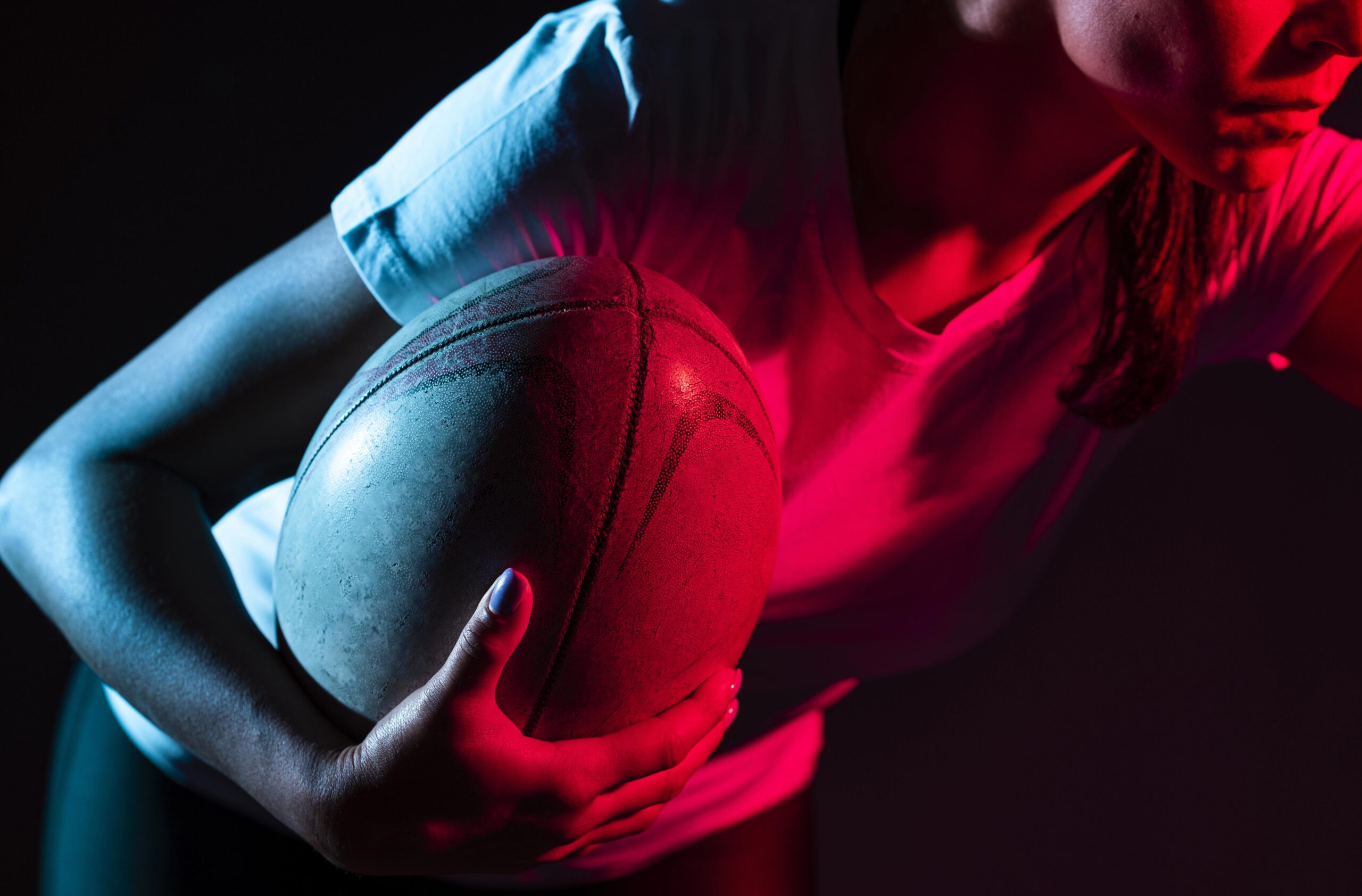 female-rugby-player-holding-ball